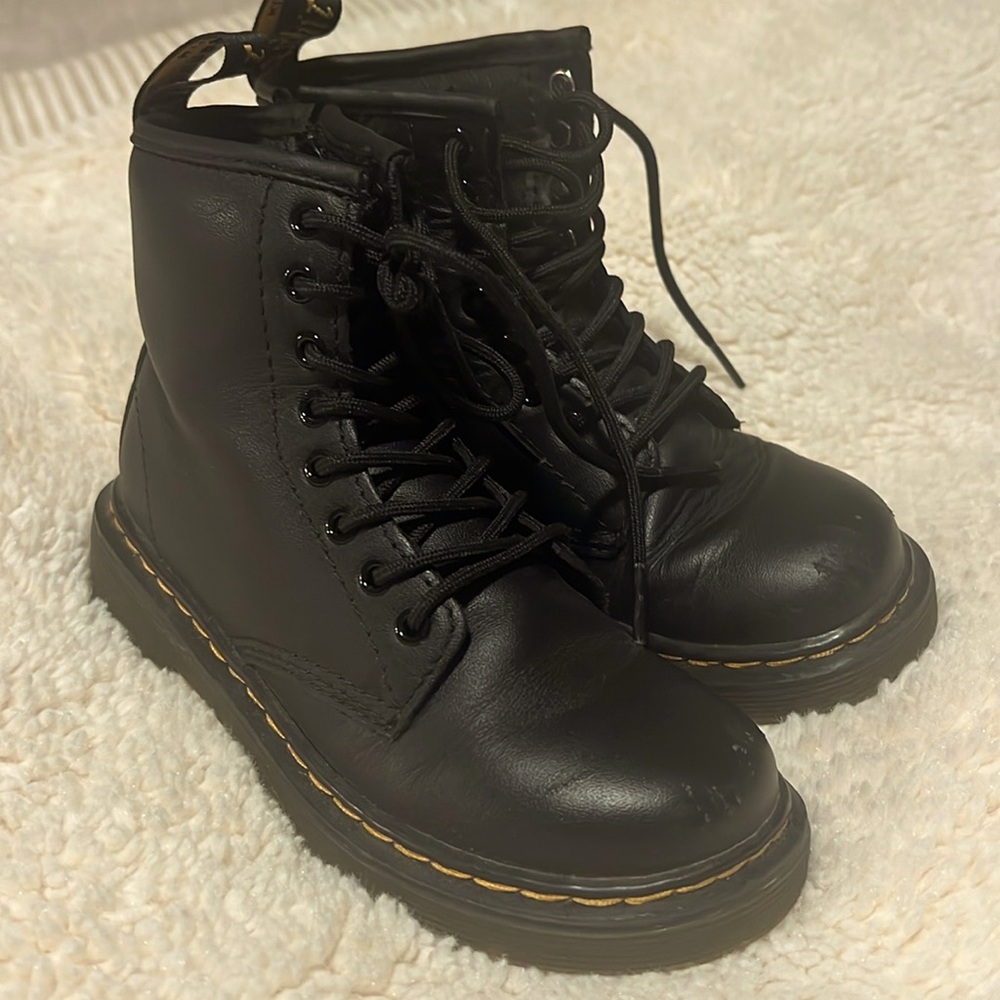 Worn a few times. Adorable girls black leather Dr Martins